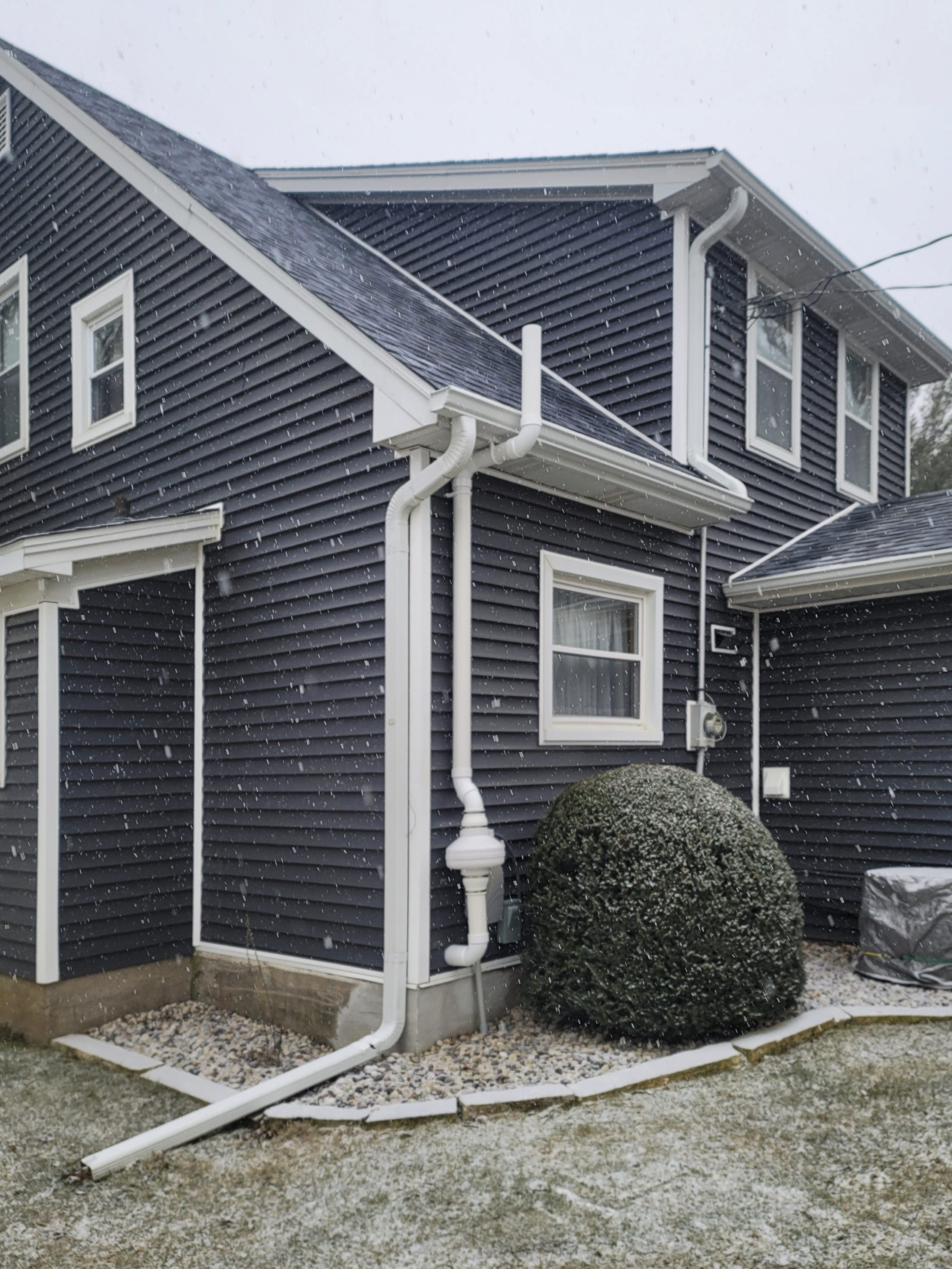 A radon mitigation system installed in Iowa by Adios Radon.