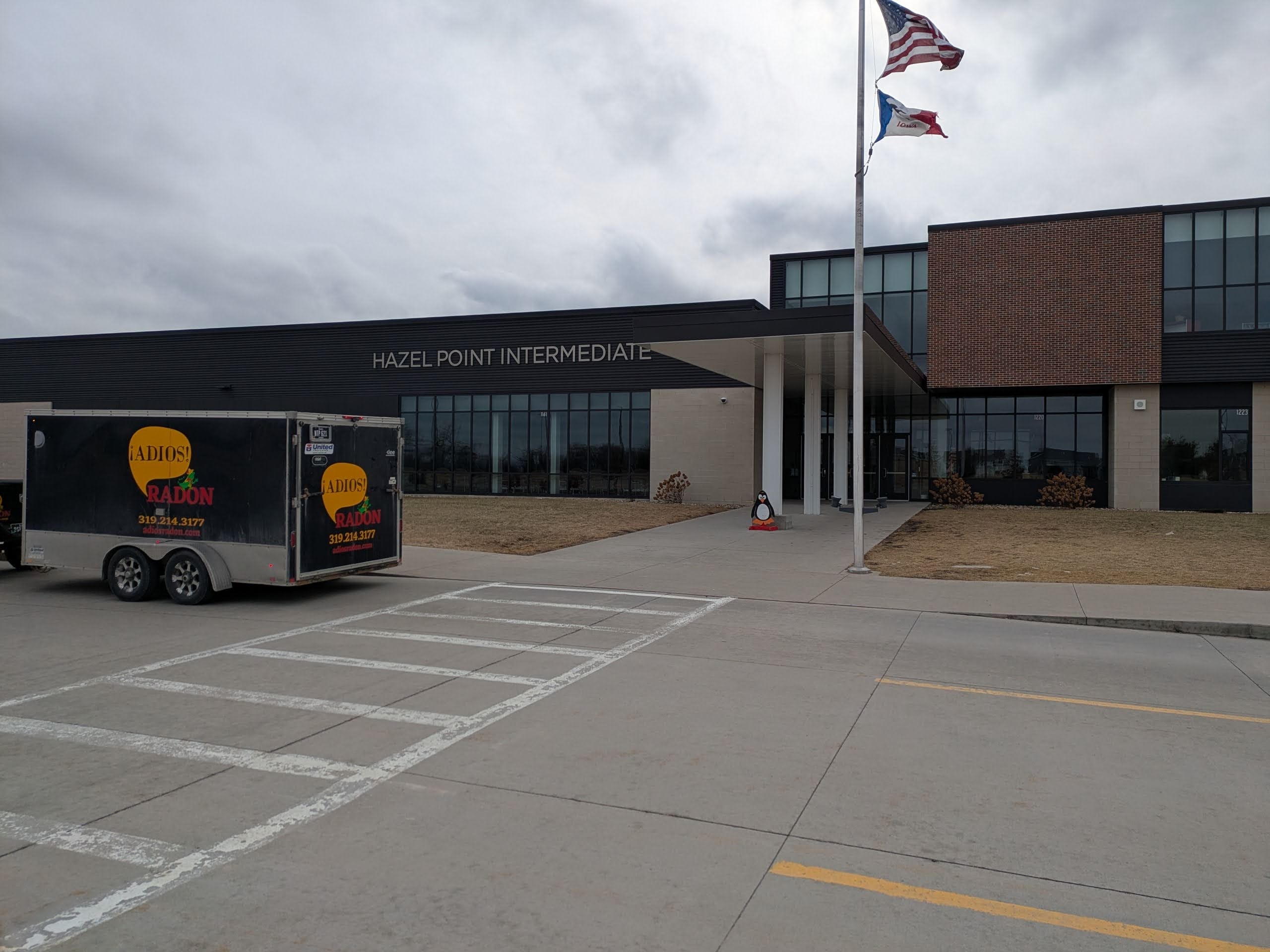 Hazel Point Intermediate School with Adios Radon trailer in parking lot

